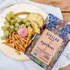 An image of Stellar Snacks' 5 ounce Maui Monk pretzels with charcuterie board